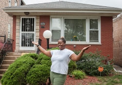 Dawn in front of her home