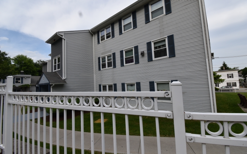 Hillside Village exterior and fence