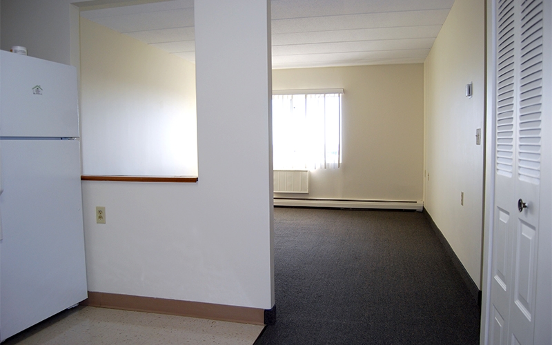Pocasset Manor living room and kitchen