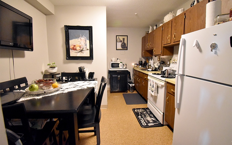 Salem Heights unit kitchen and dining area