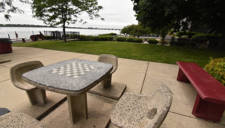 8330 On the River courtyard and chess tables
