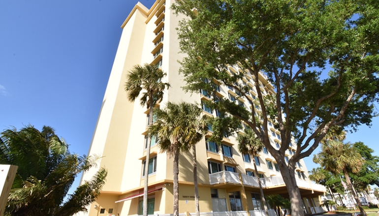 Trinity Towers East building and trees