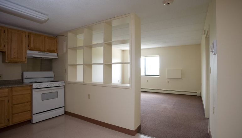 Hillcrest Village unit kitchen and living room