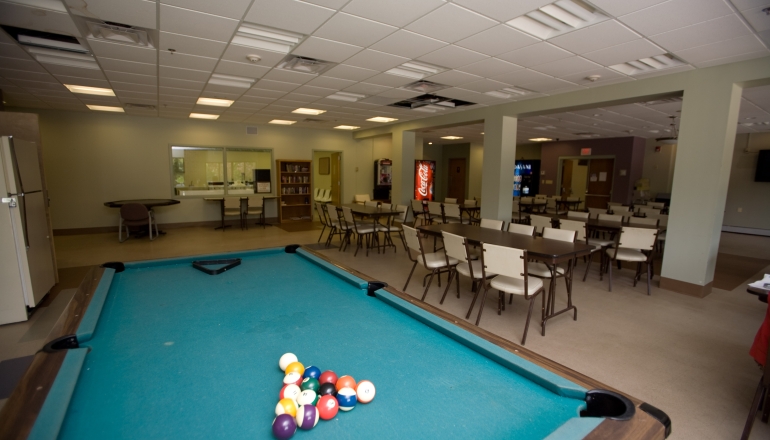 Hillcrest Village common room and pool table