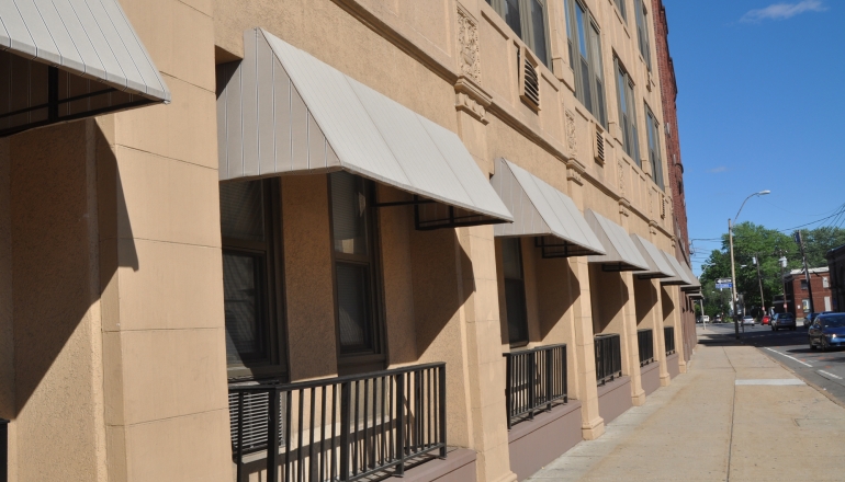 Tribune Apartments exterior and sidewalk