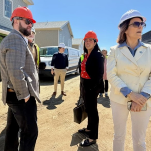 Juana Matias, center, secretary of the Executive Office of Housing and Livable Communities, visited Cape Cod on Tuesday to tour affordable housing sites. With her are state Sen. Julian Cyr, left, and Rep. Hadley Luddy, right.